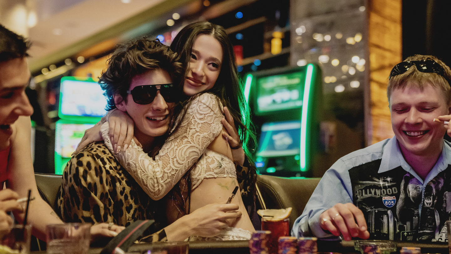 Mark Eydelshteyn as Ivan and Mikey Madison as Ani in Anora